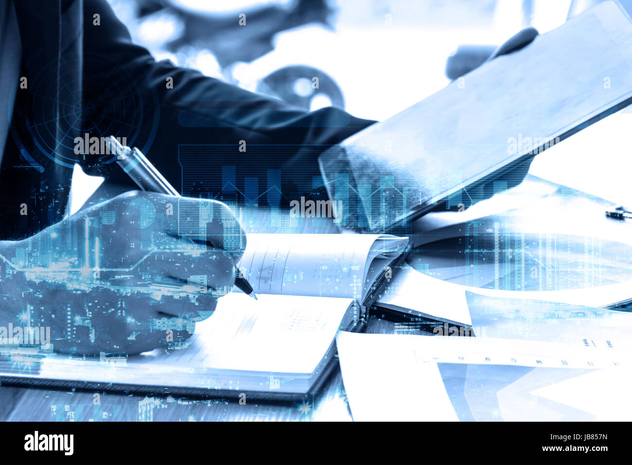 double exposure businessman writes business plan with tablet, selective focus Stock Photo