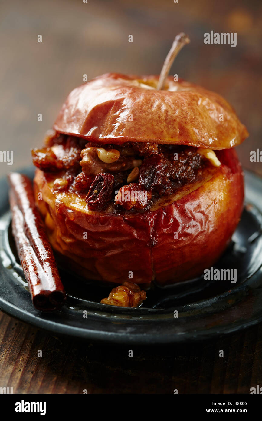 baked apple with cinnamon, brown sugar, butter, walnuts and raisins
