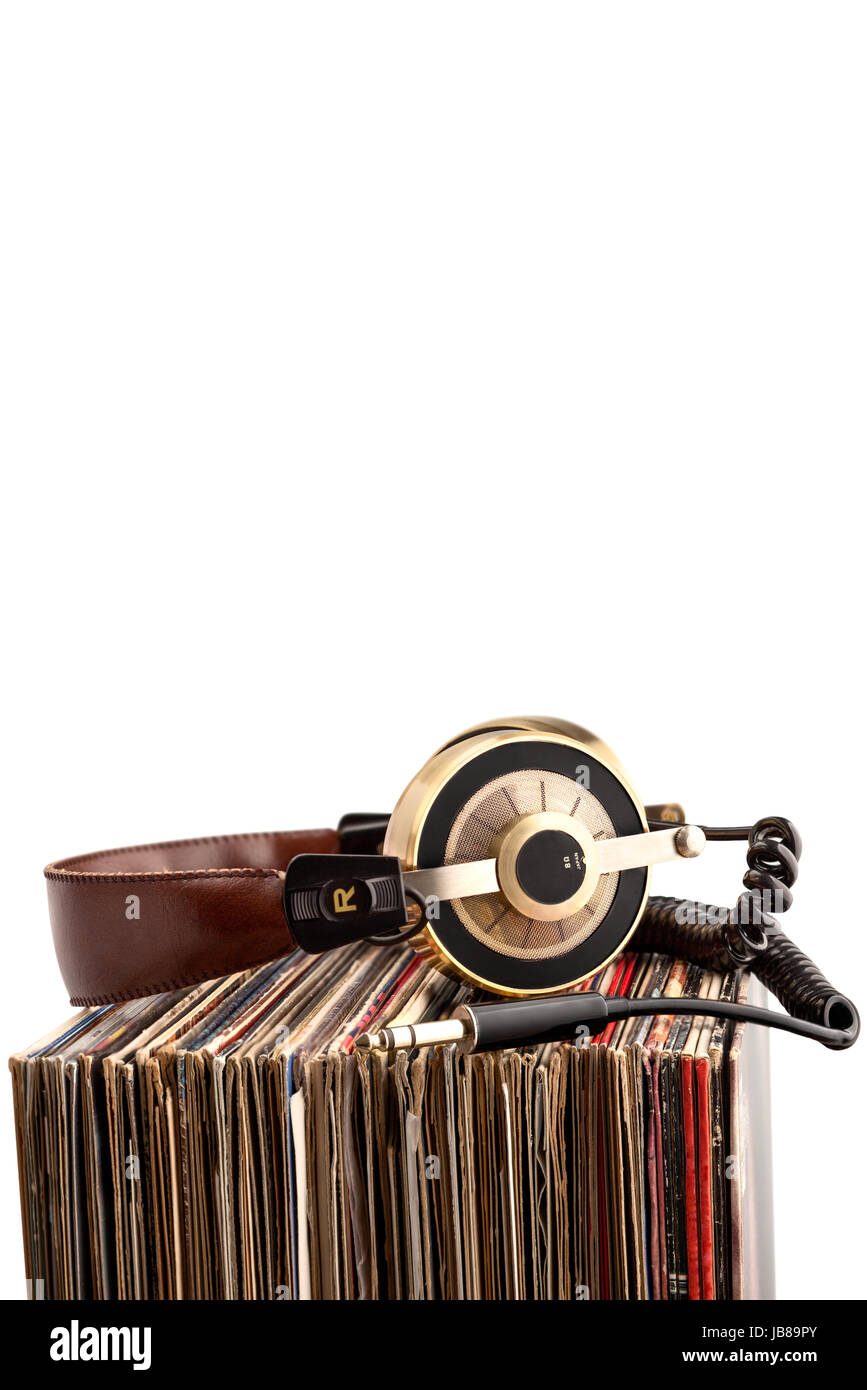 Retro headphones for professional audio with vintage vinyl records