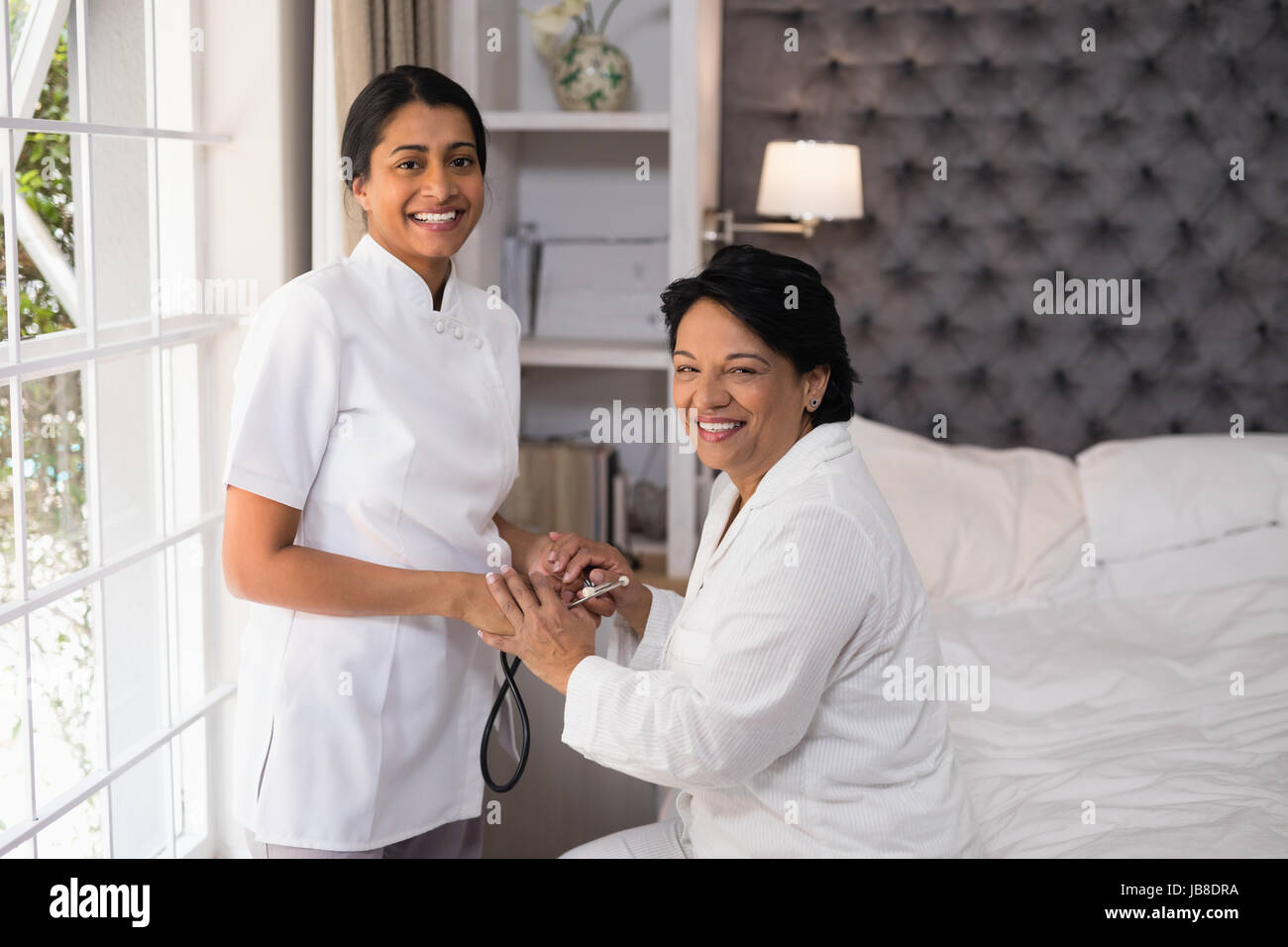 Indian nurse helping patient hires stock photography and images Alamy