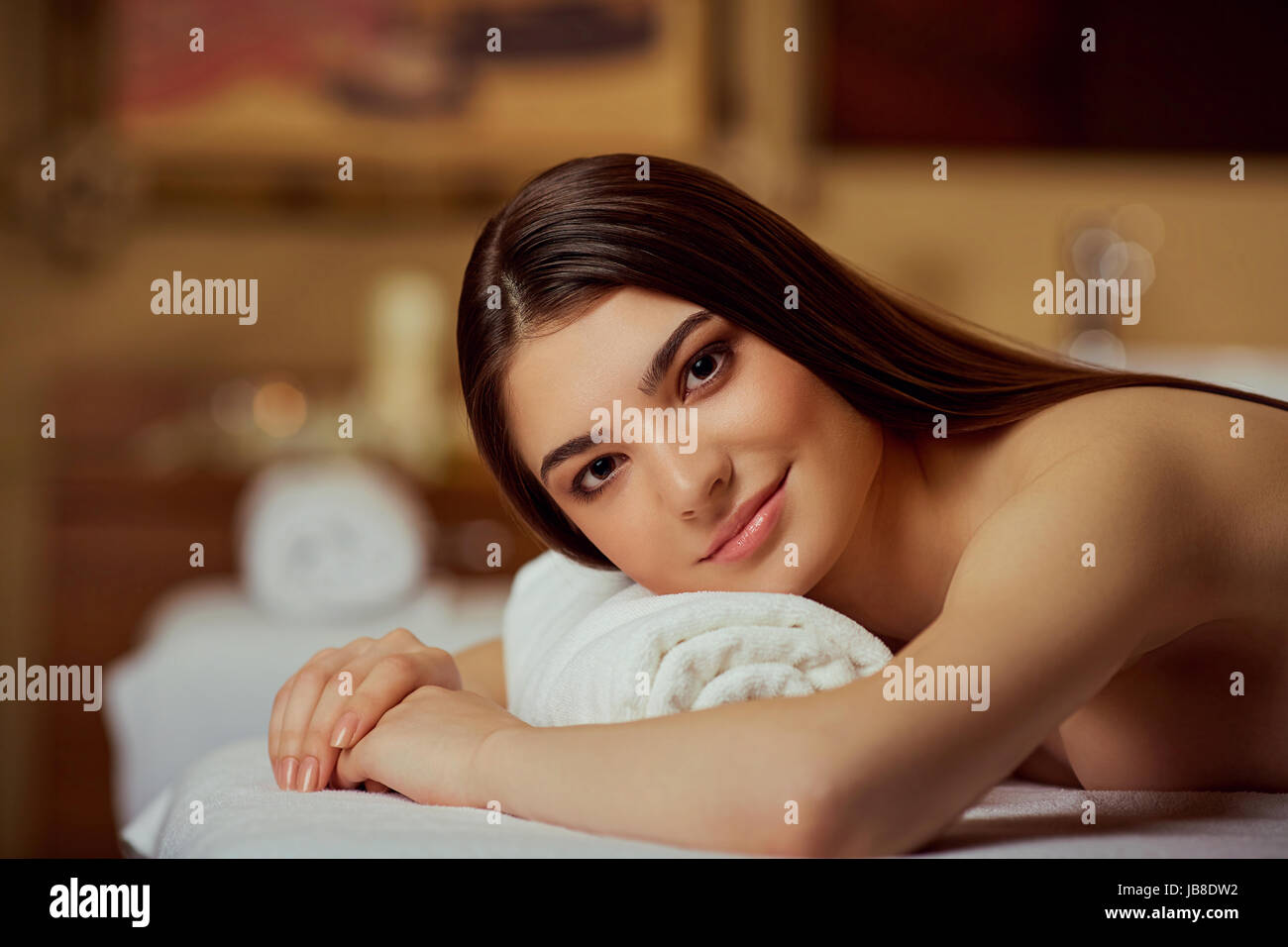 Portrait of a beautiful woman close-up lying down in a spa salon Stock Photo