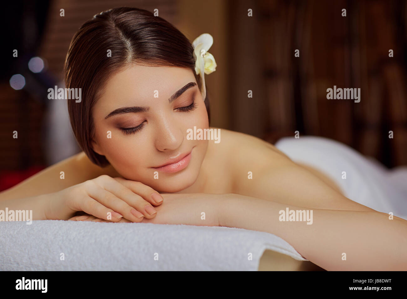 Portrait of a beautiful woman close-up lying down in a spa salon Stock Photo