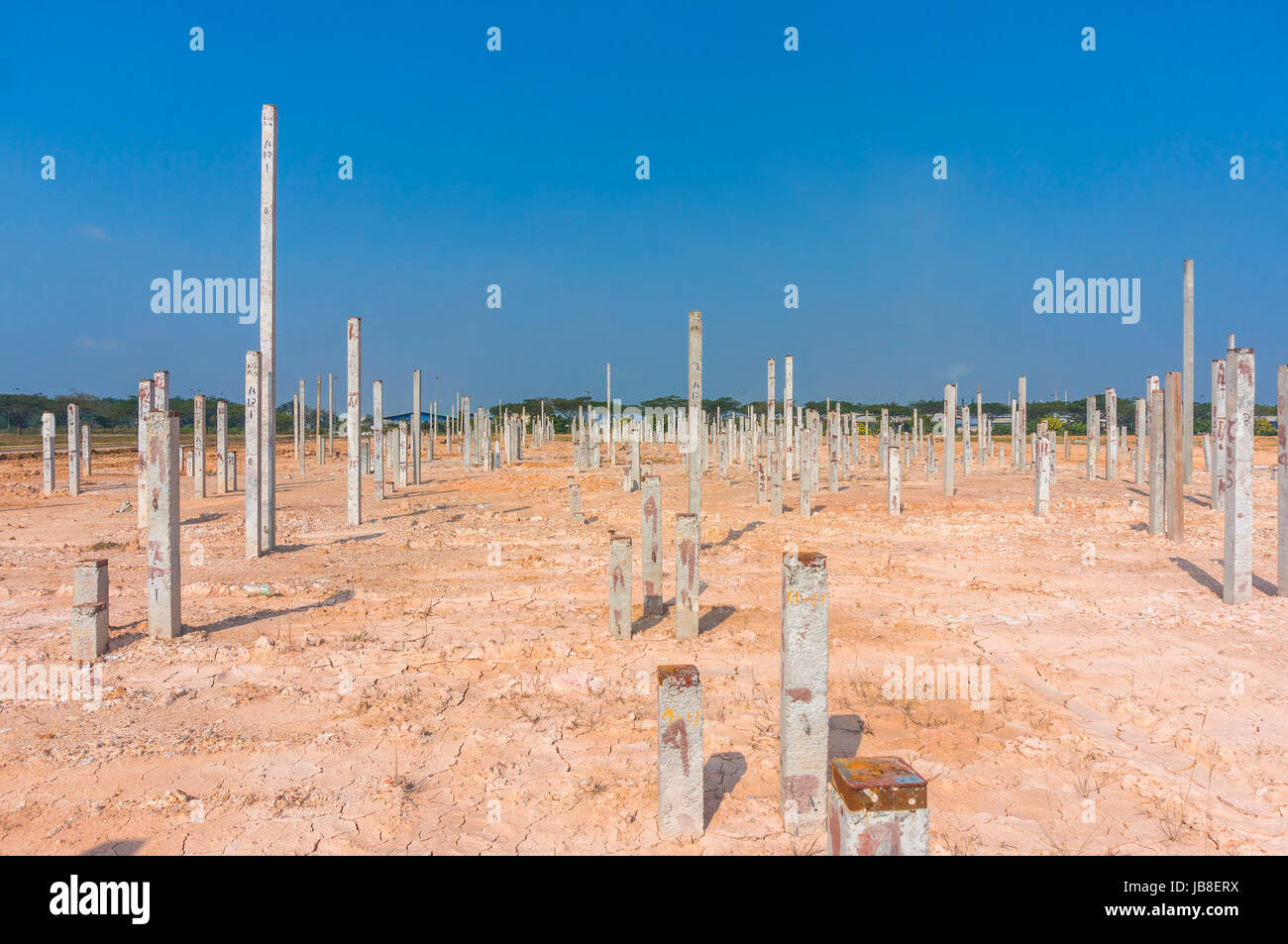 Piling work at construction site with blue skies background Stock Photo ...