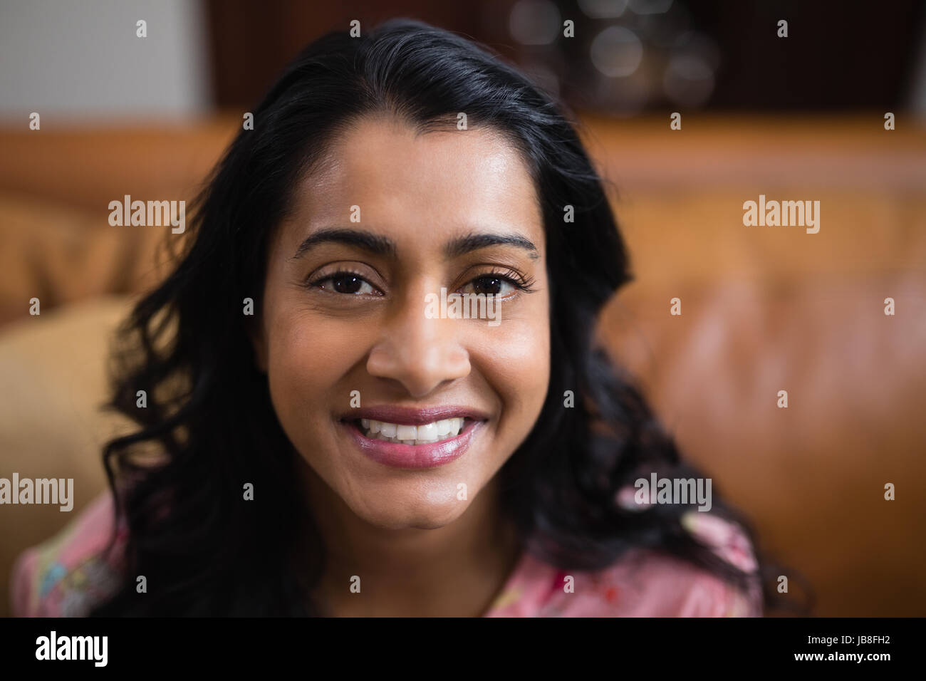 Portrait of beautiful smiling young woman at home Stock Photo - Alamy