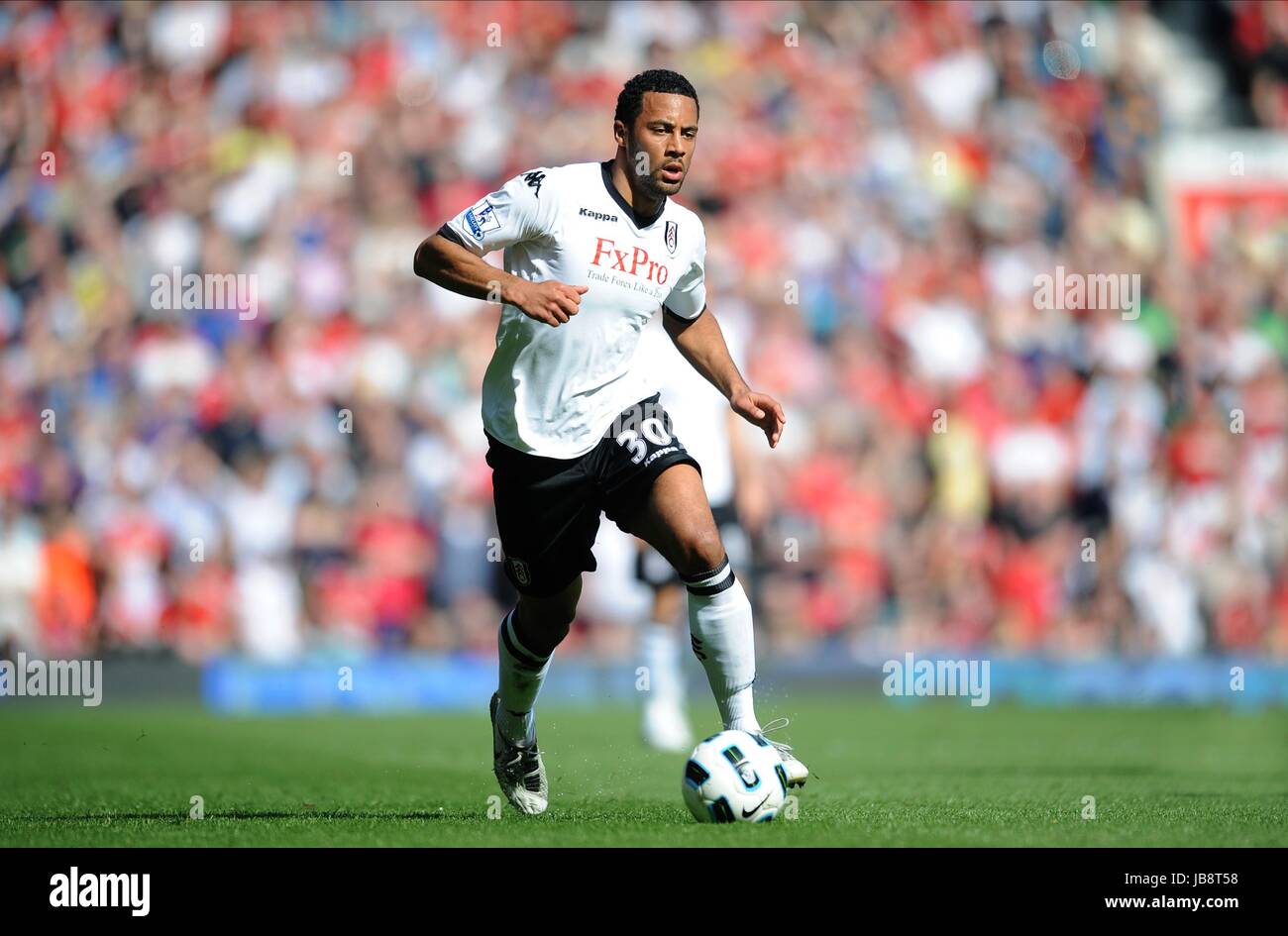 MOUSSA DEMBELE FULHAM FC FULHAM FC OLD TRAFFORD MANCHESTER ENGLAND 09 April 2011 Stock Photo