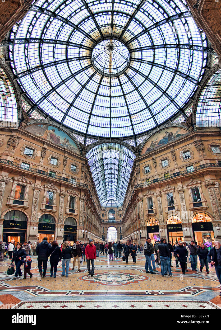 MILAN - NOVEMBER 15: Galleria Vittorio Emanuele II vertical oriented image  - the oldest shopping mall housed within a four-storey and includes shops,  restaurants and bars. Galleria named after first king of
