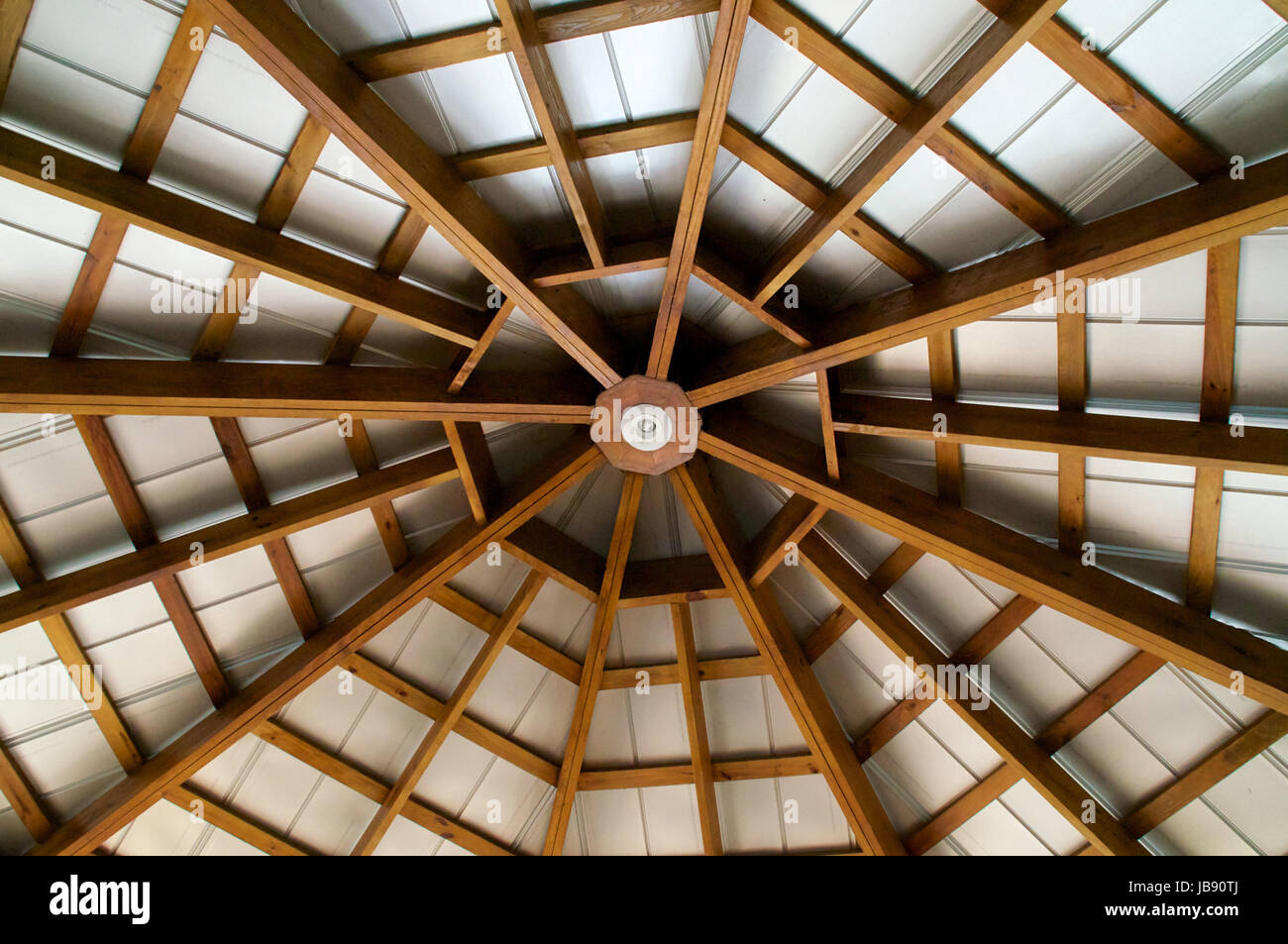 An Octagon Shaped Exposed Beam Ceiling Is Covered With A Tin