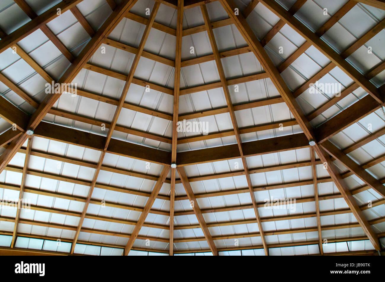 An Exposed Beam Ceiling Is Covered With A Tin Roof Seen