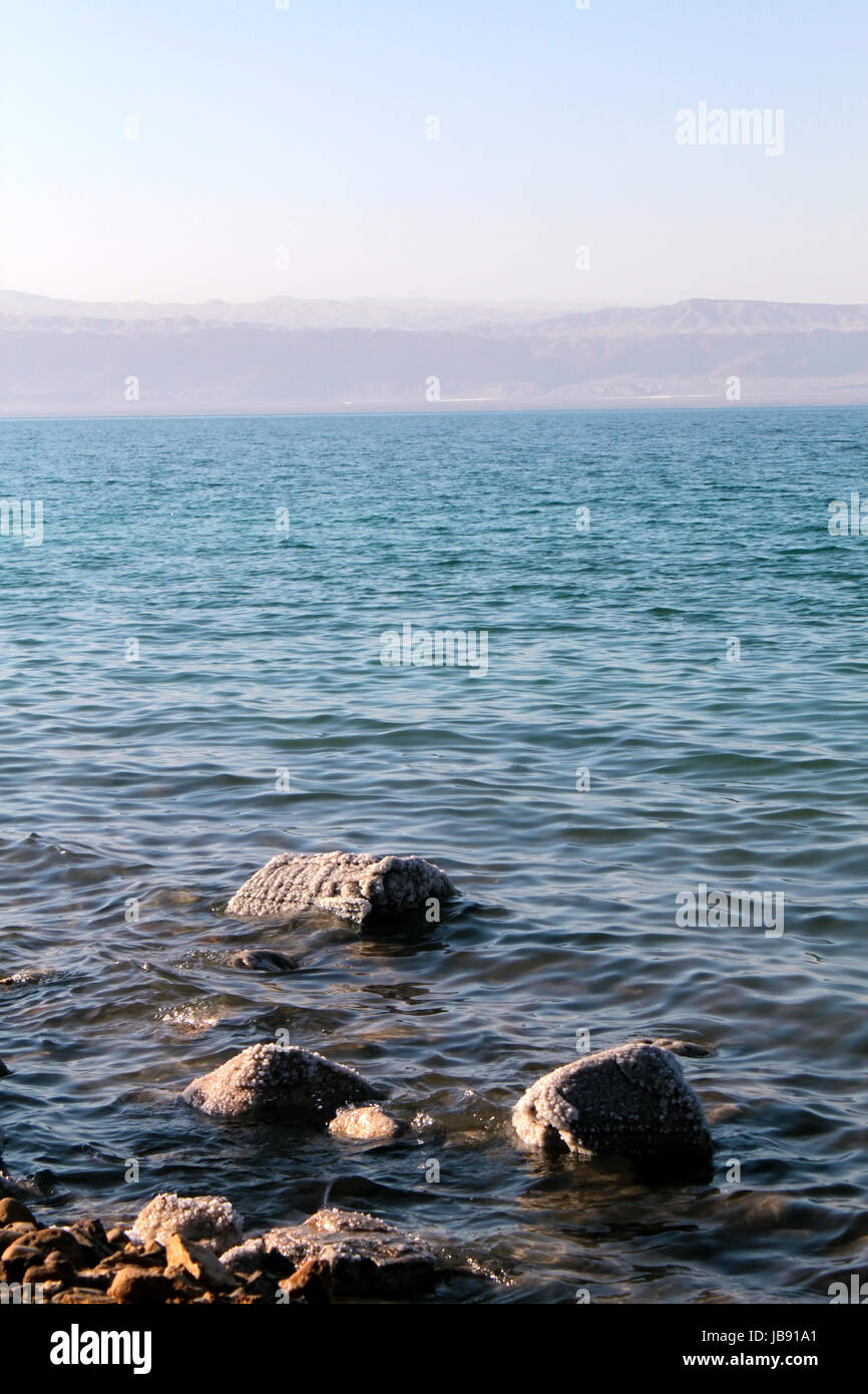 Dead Sea coastline, whit salt crystals and formations in the sand. Jordan Stock Photo