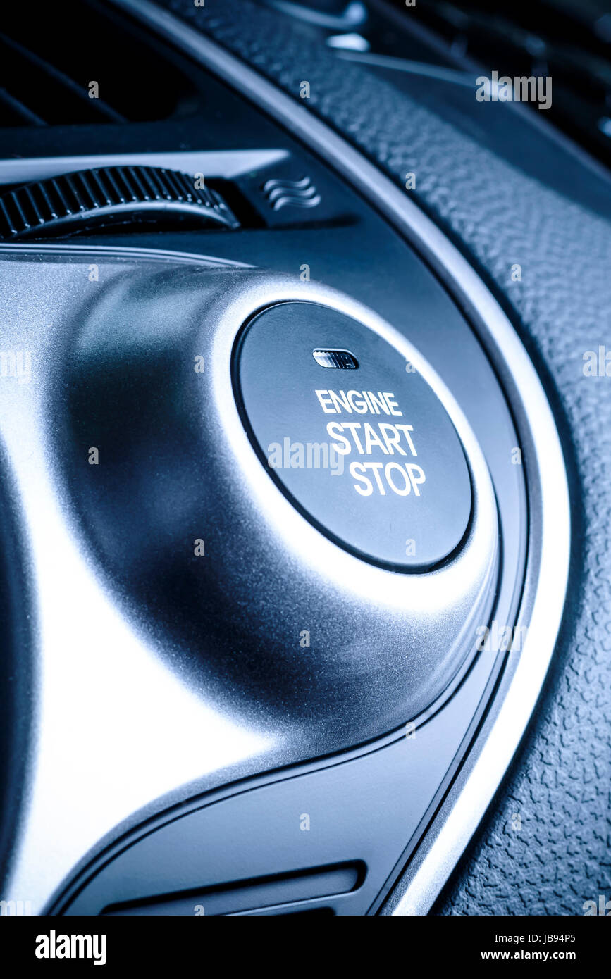 START/STOP ignition button in car, vehicle with visible fragment of