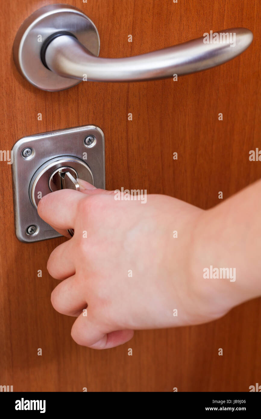 closing apartment door by key close up Stock Photo Alamy