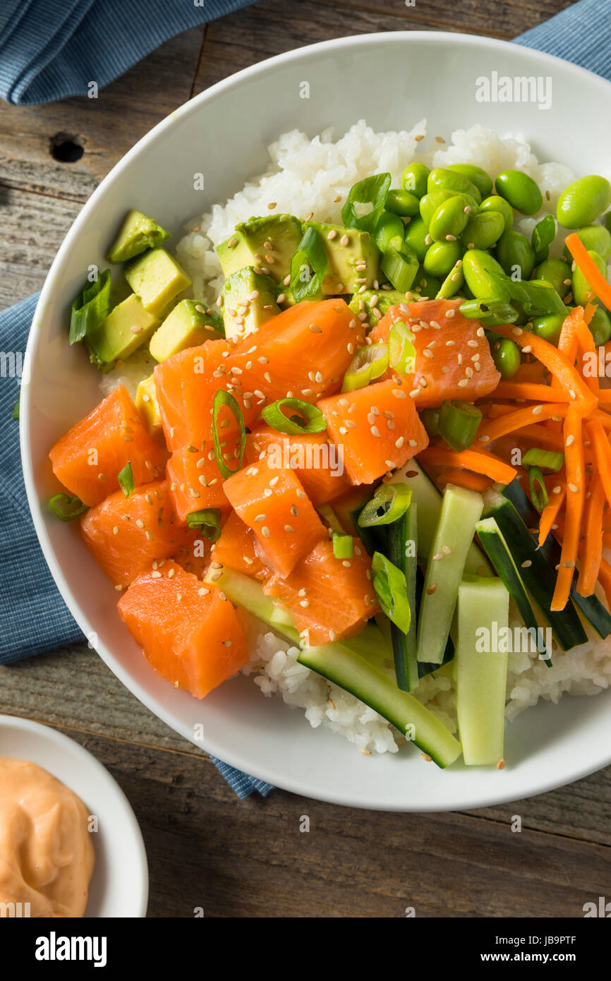 Raw Organic Salmon Poke Bowl with Rice and Veggies Stock Photo Alamy