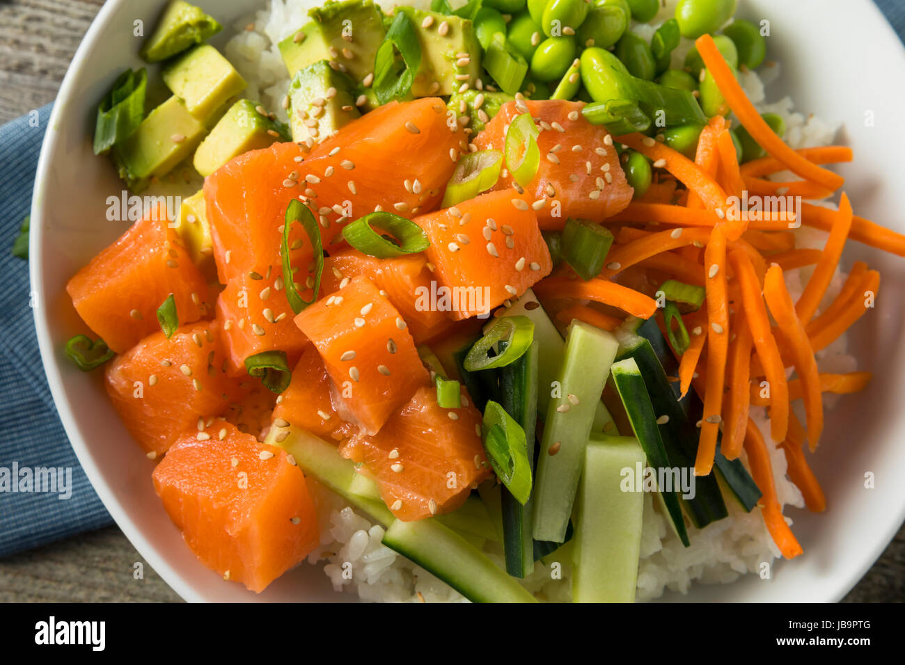 Raw Organic Salmon Poke Bowl with Rice and Veggies Stock Photo Alamy