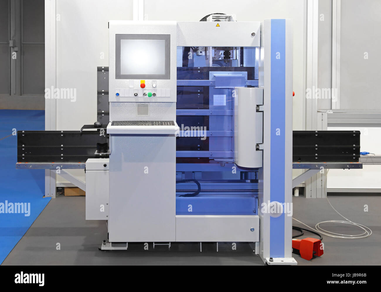 Modern computer numerical control machine center Stock Photo - Alamy