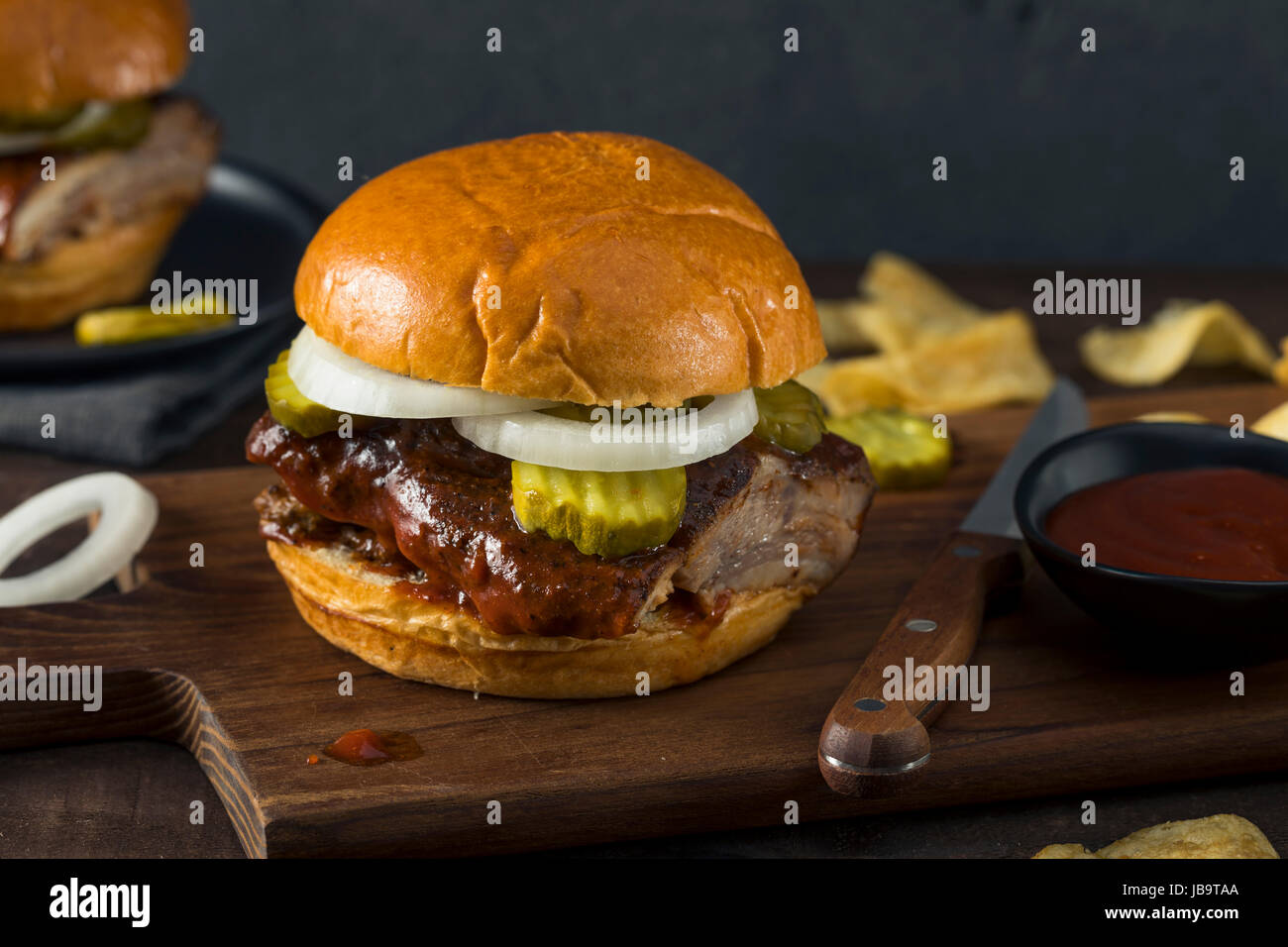 Homemade Smoked BBQ Rib Sandwich with Pickles and Onion Stock Photo Alamy