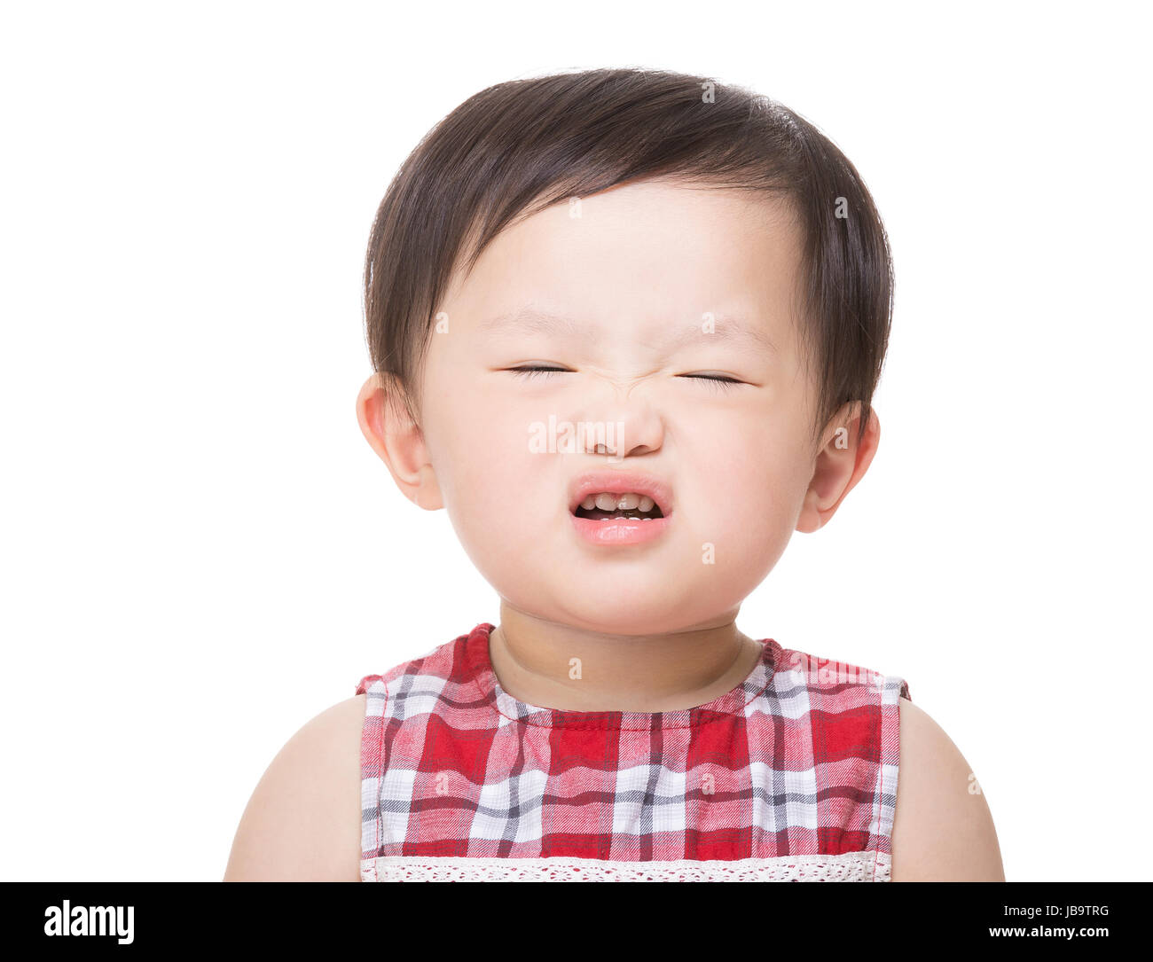 Baby making funny face Stock Photo
