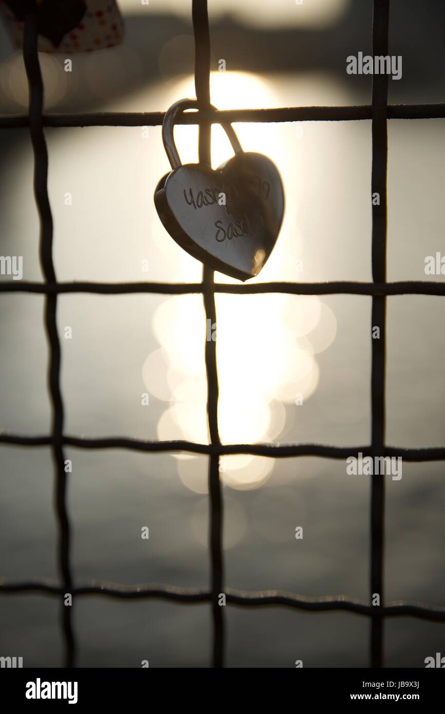 Love padlock on the railing of a bridge, Berlin, Germany Stock Photo