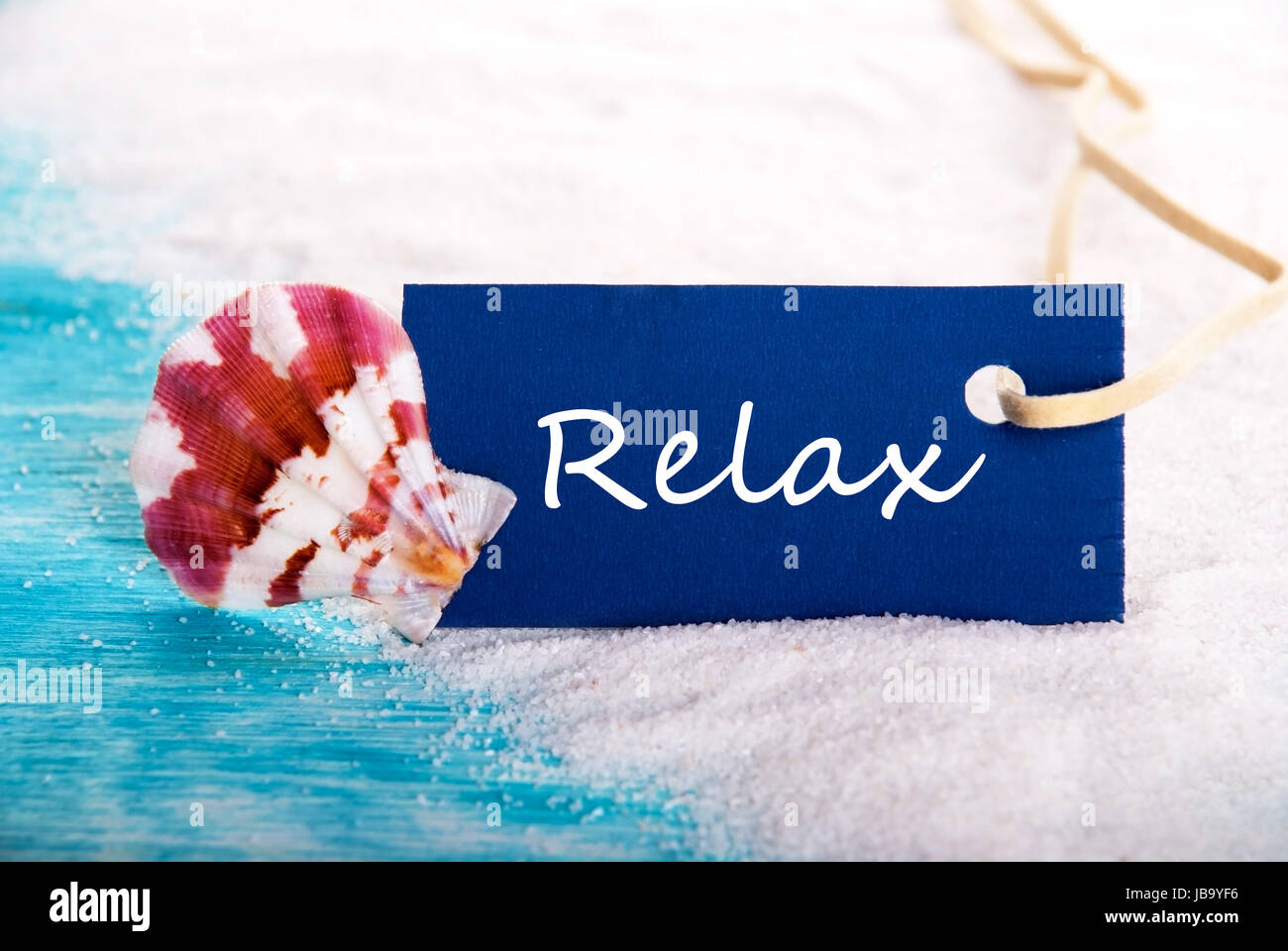 Label with Relax at the Beach with Shell Stock Photo - Alamy
