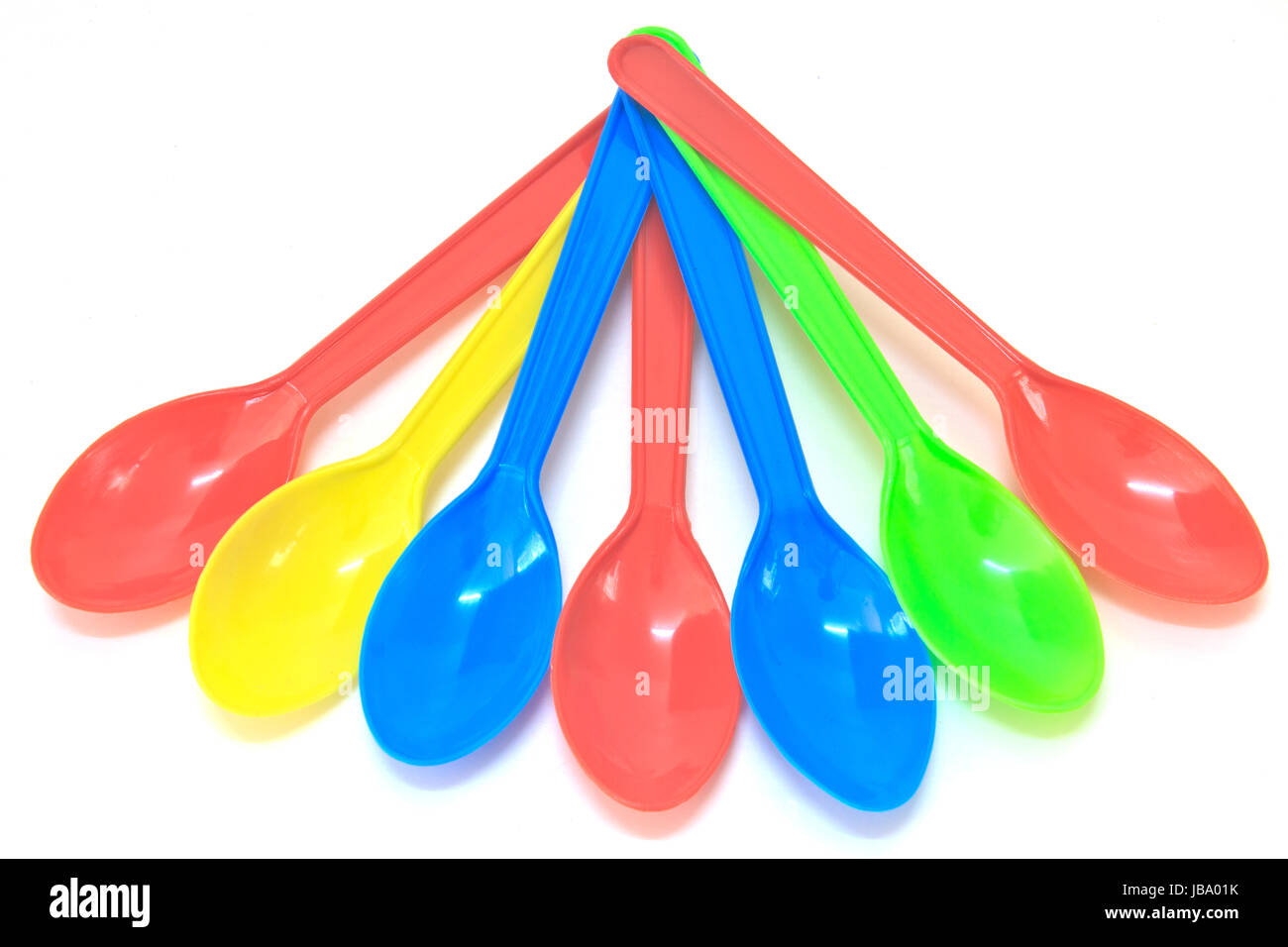 Colorful Spoon plastic isolated on white background Stock Photo - Alamy