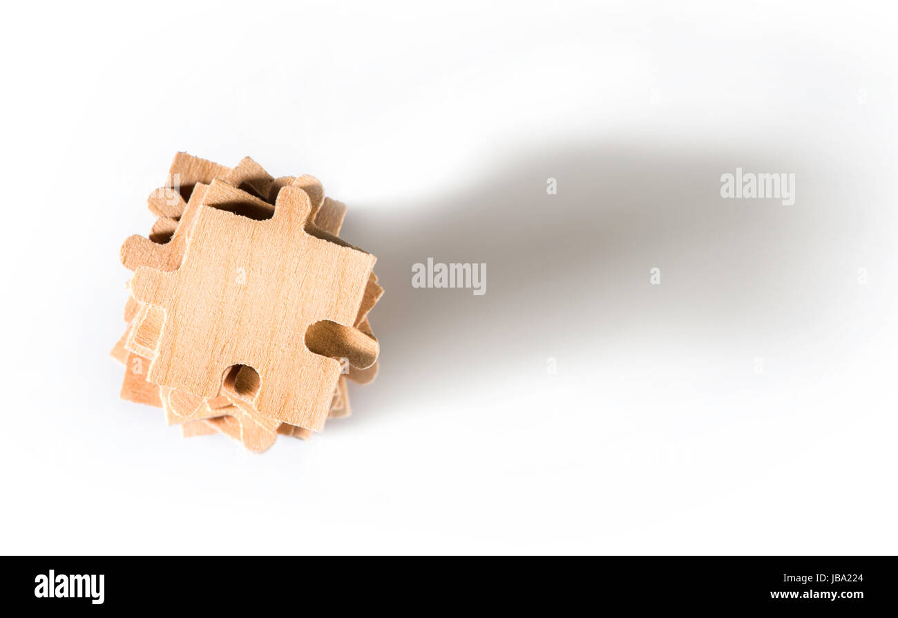Wooden puzzle on white background. White isolated Stock Photo - Alamy