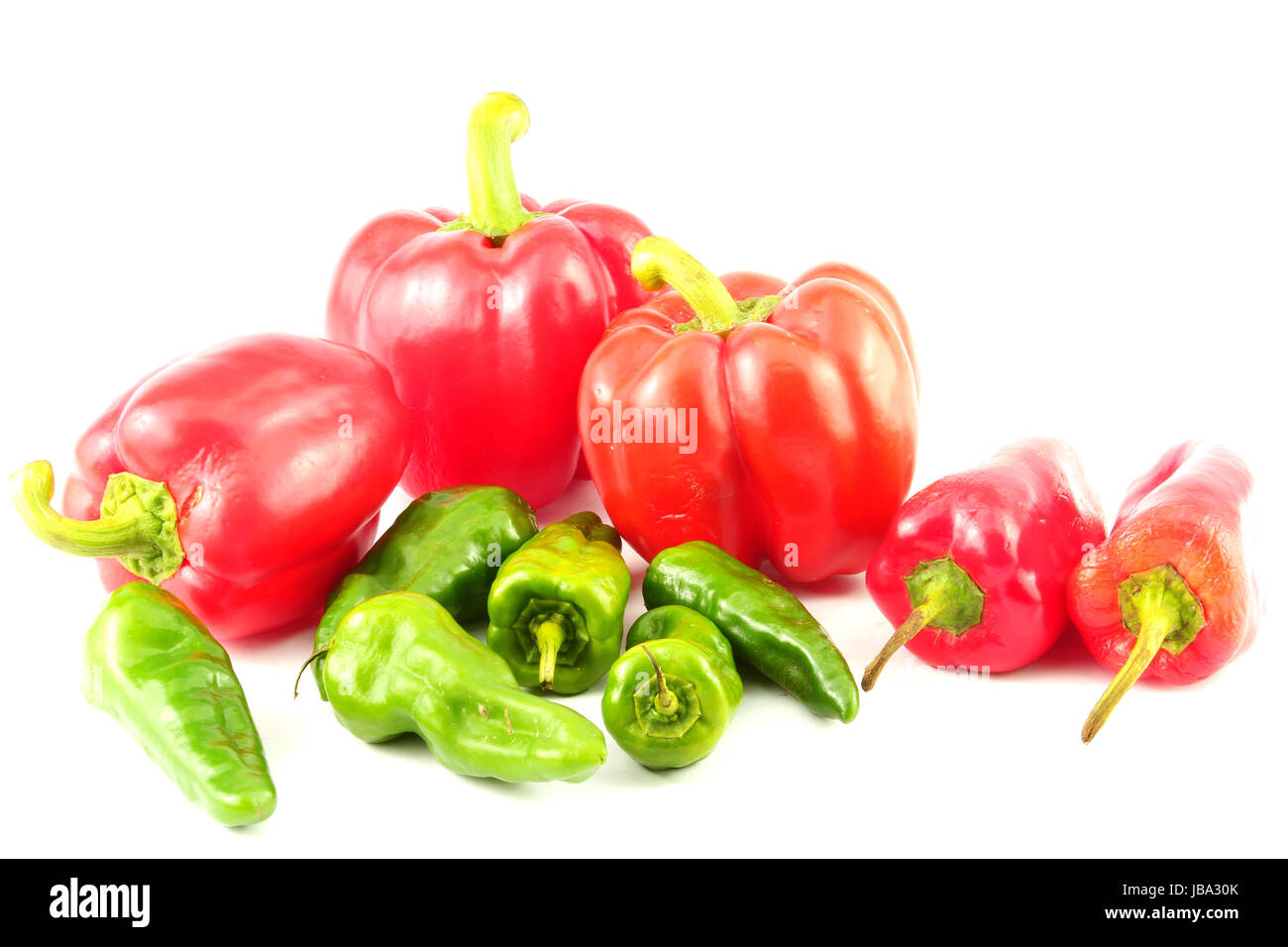 red and green sweet pepper with pure white background Stock Photo - Alamy