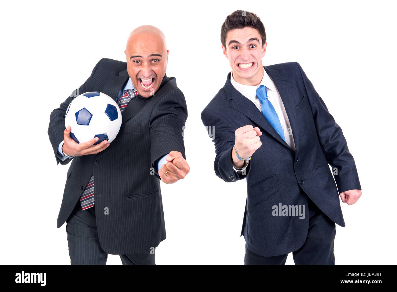 Happy businessmen with a soccer ball isolated in white Stock Photo - Alamy