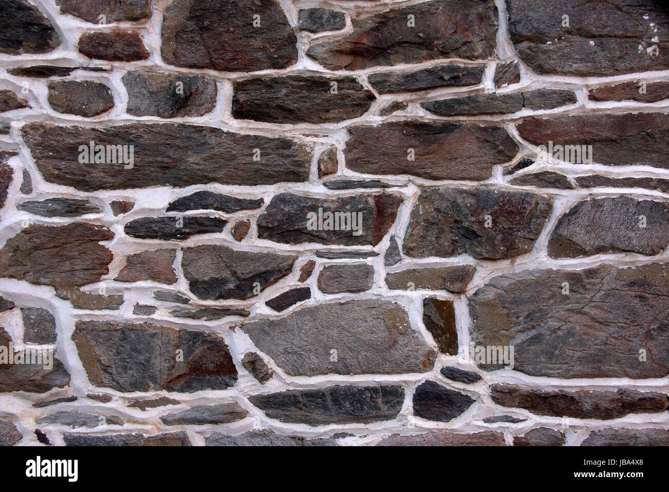 A background image of an old stone wall Stock Photo - Alamy
