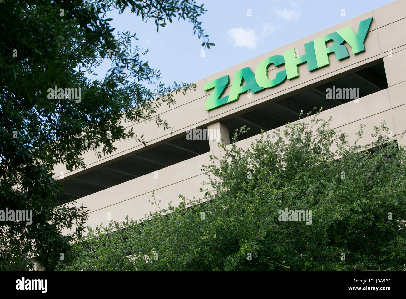 A logo sign outside of a facility occupied by the Zachry Group in