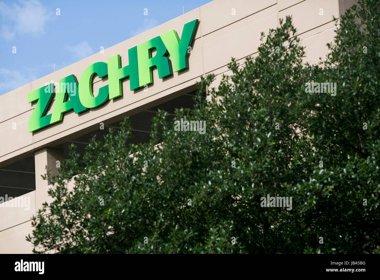 A logo sign outside of a facility occupied by the Zachry Group in