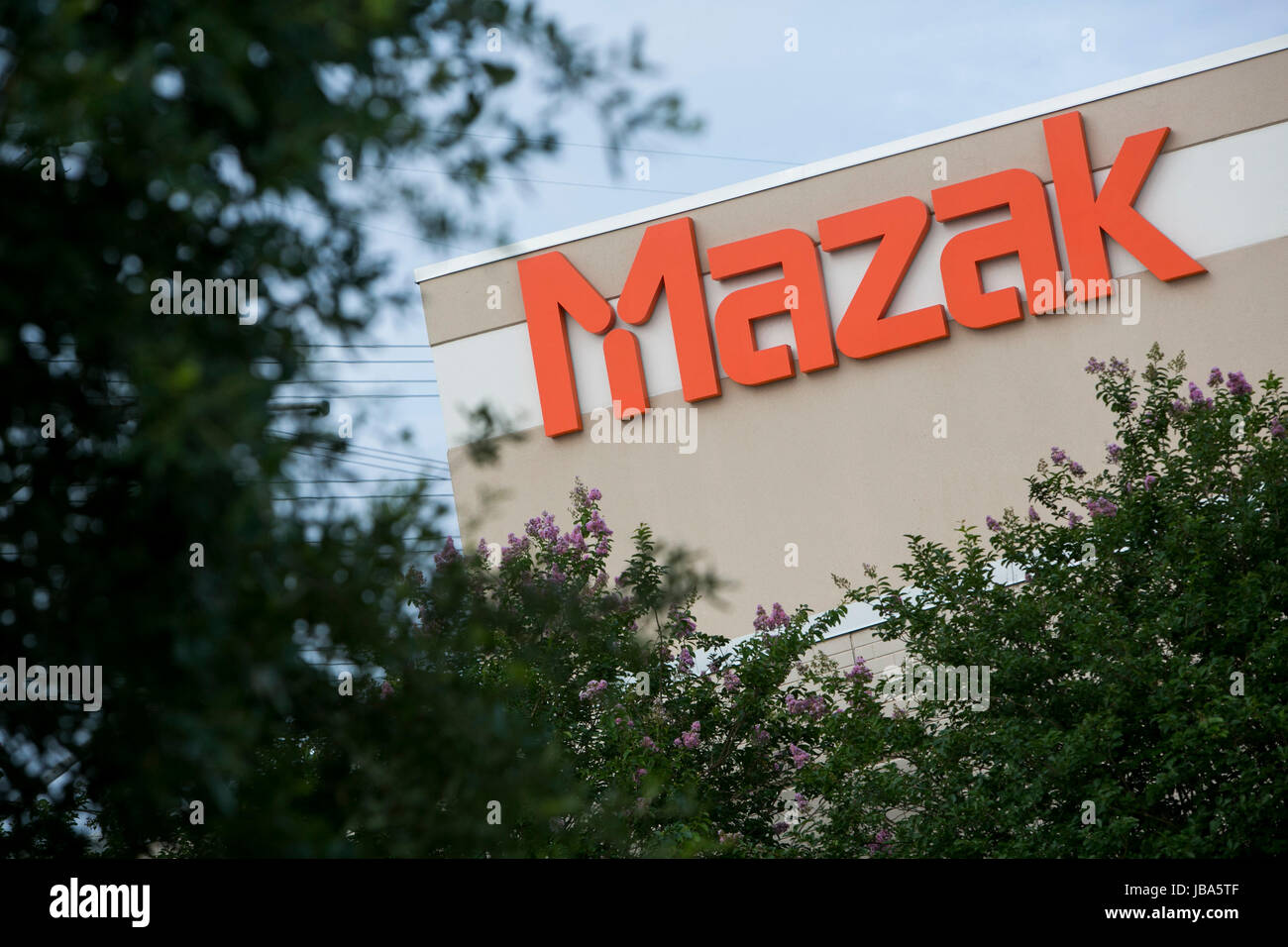 A logo sign outside of a facility occupied by Yamazaki Mazak