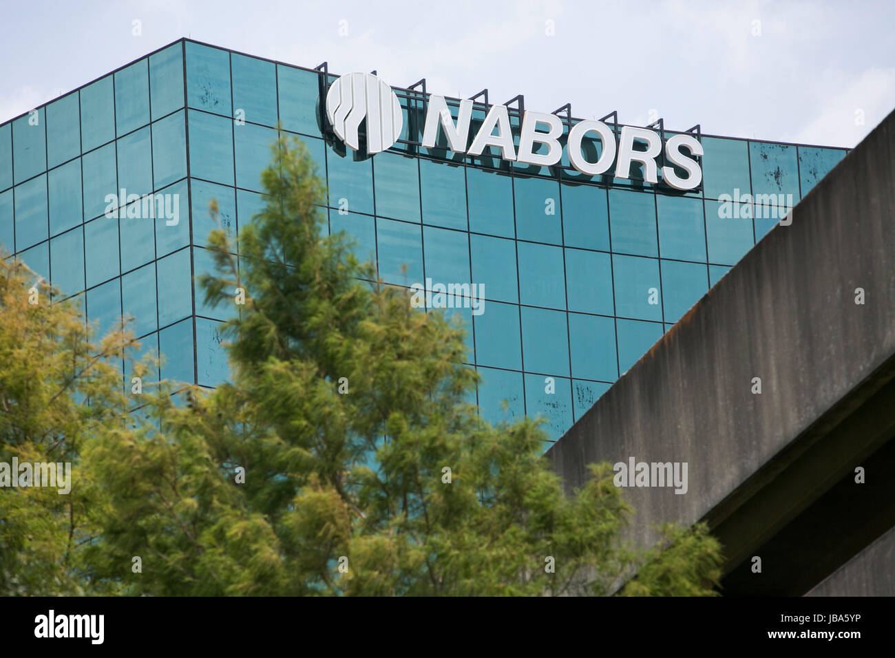 A logo sign outside of a facility occupied by Nabors Industries Ltd, in