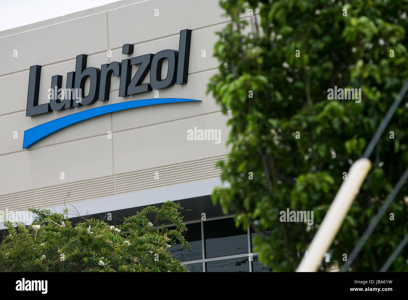 A logo sign outside of a facility occupied by The Lubrizol Corporation
