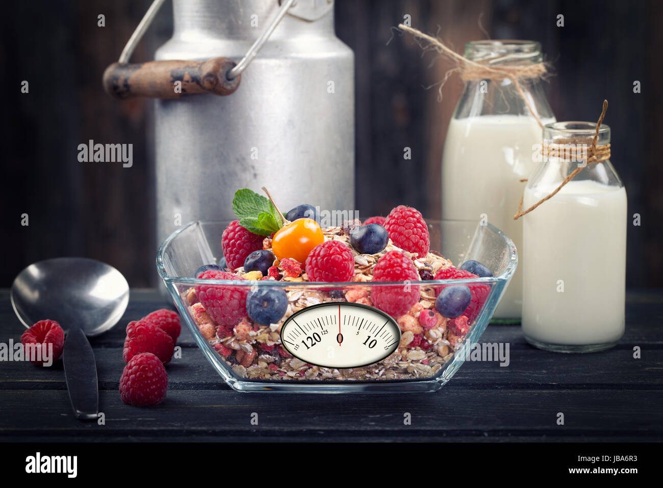 muesli with milk against dark background Stock Photo Alamy