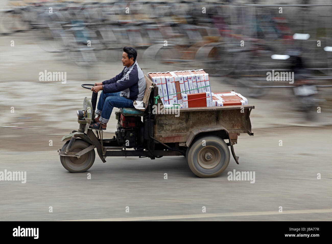 Man on trike, Ninh Binh, Vietnam Stock Photo