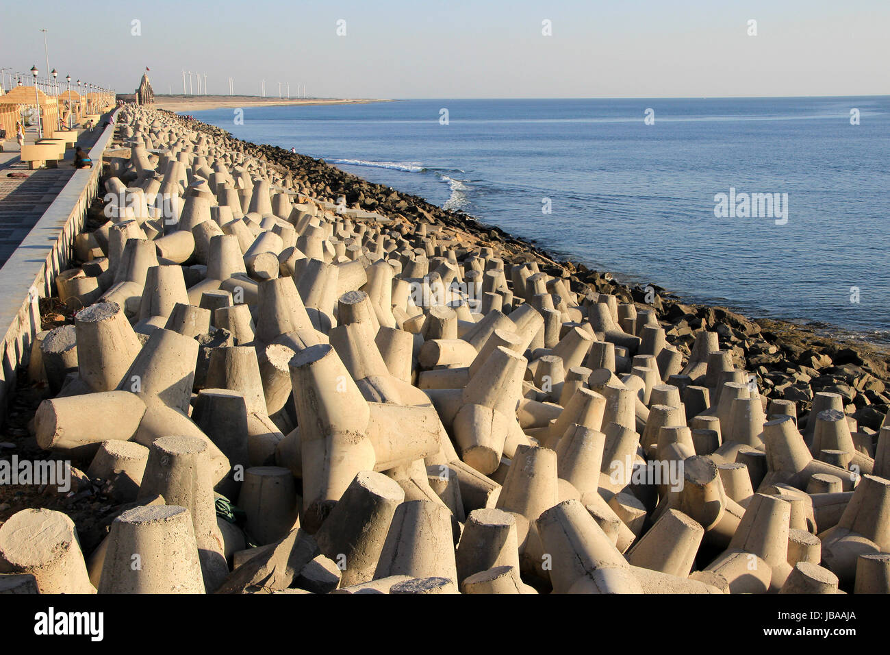 Dumping precast concrete blocks to prevent sea erosion at Port Beach