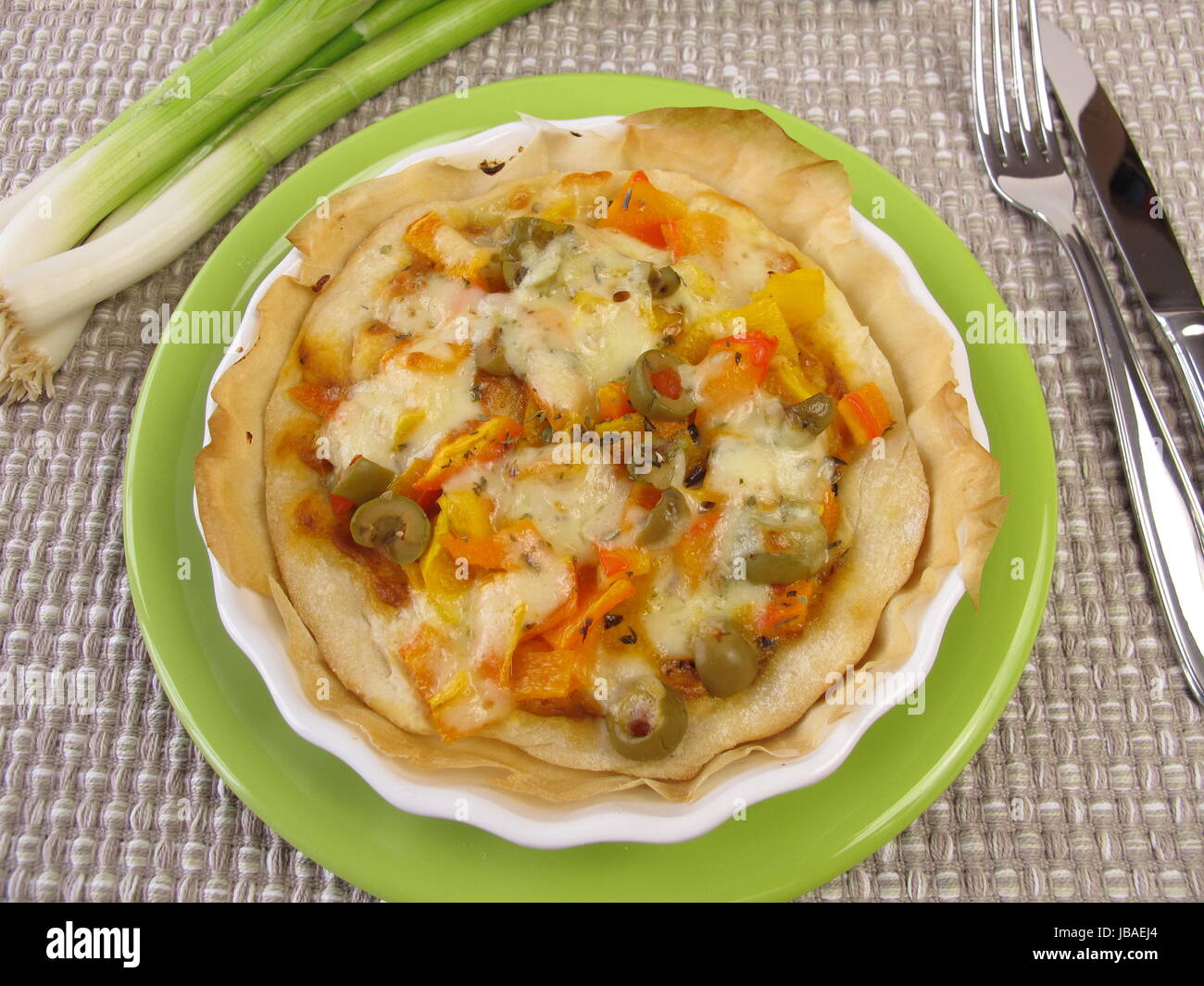 small quiche with vegetables in a tart dish Stock Photo