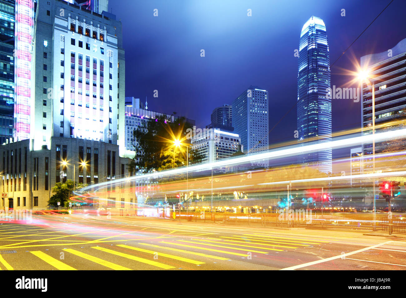 Hong Kong city with traffic at night Stock Photo - Alamy