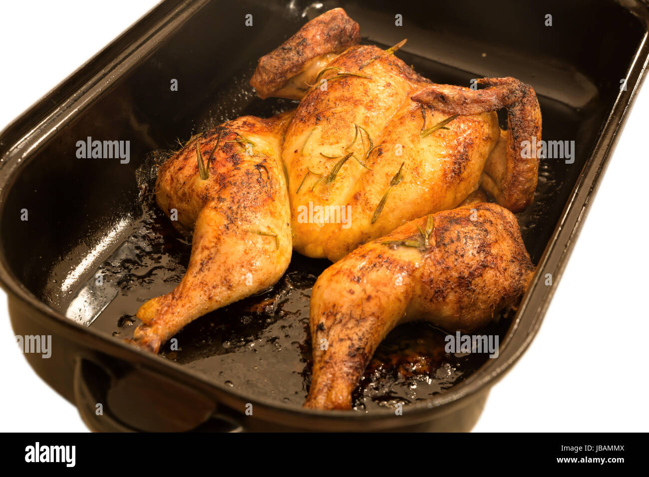 Plattes Huhn im Bräter Stock Photo - Alamy