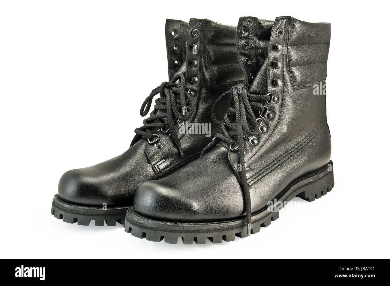 A pair of tall black leather boots army is isolated on a white ...