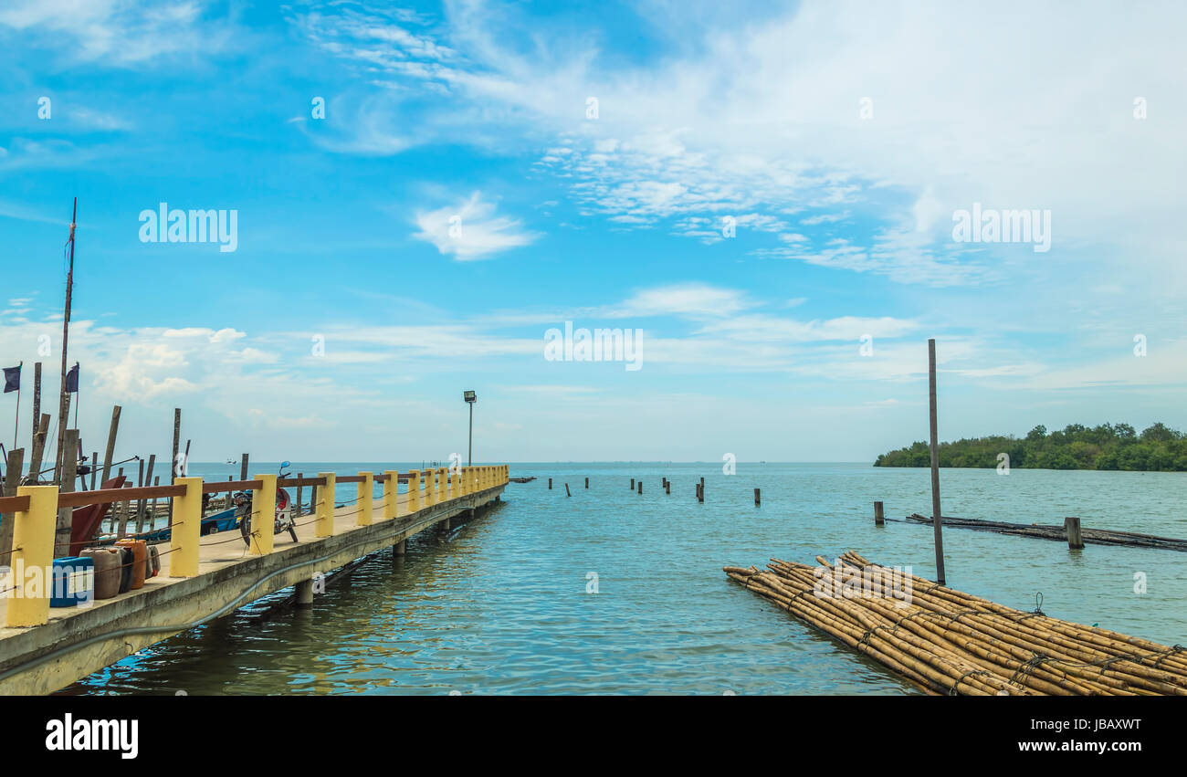Jetty with blue skies Stock Photo - Alamy