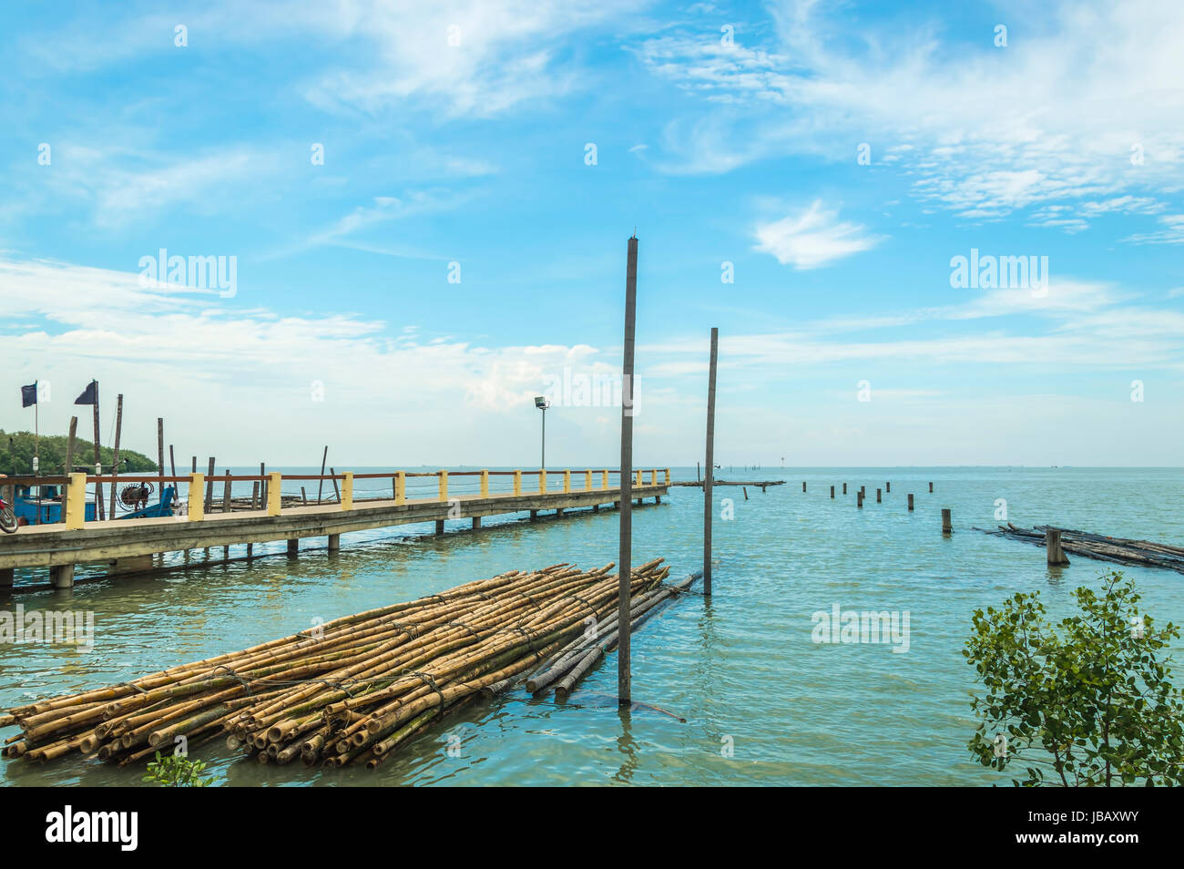 Jetty with blue skies Stock Photo - Alamy