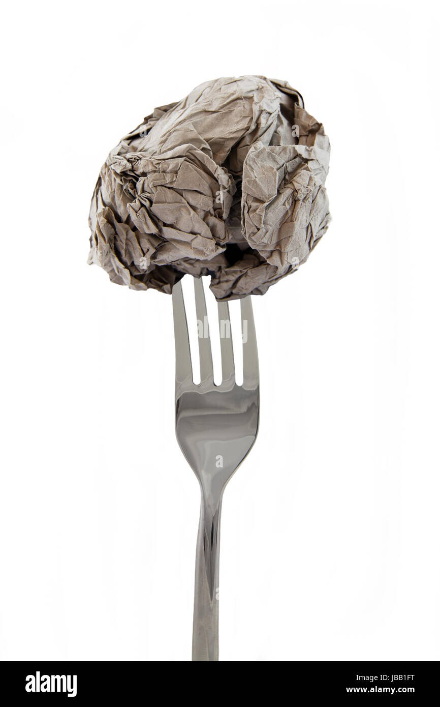 paper balls on fork Stock Photo