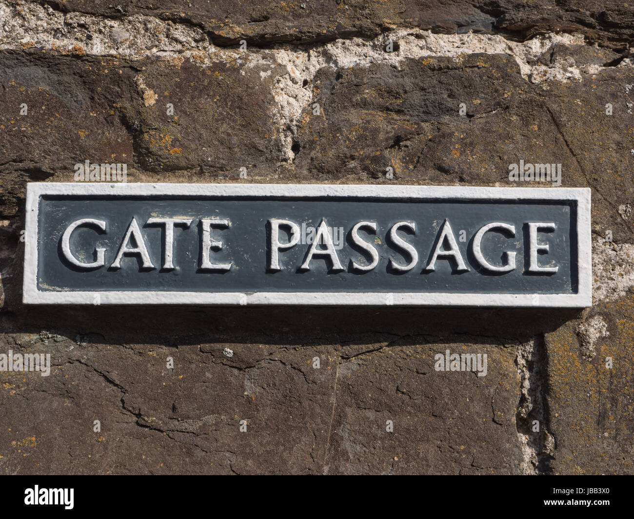 Sign Â´Gate PassaheÂ´ inside massive Conwy Castle in Wales built by king Edward I as one of the fortifications during the conquest of Wales in the 13th Century Stock Photo