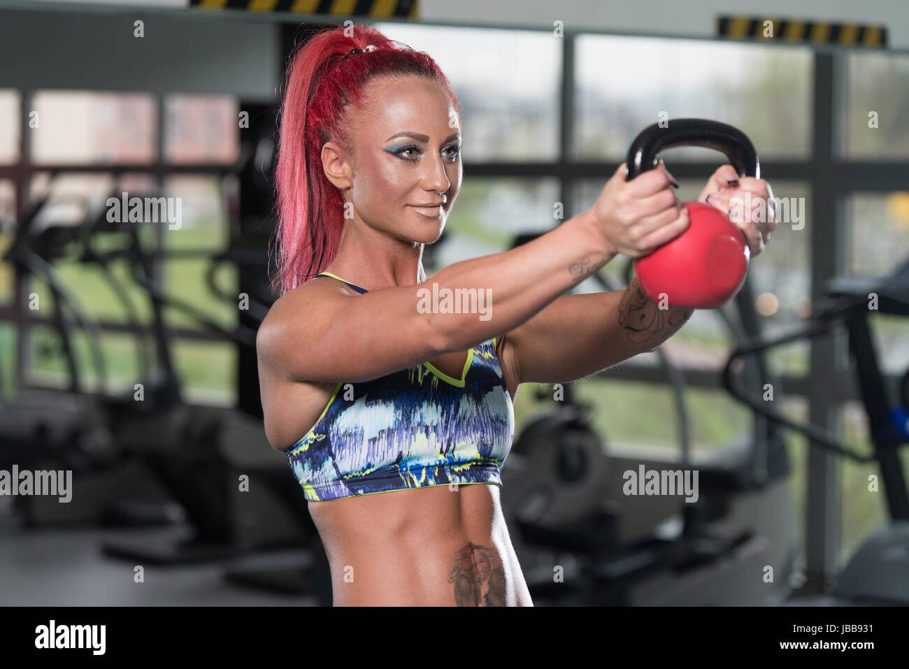 Muscular Female Athlete Wearing Red Sports Stock Photo 1131448475