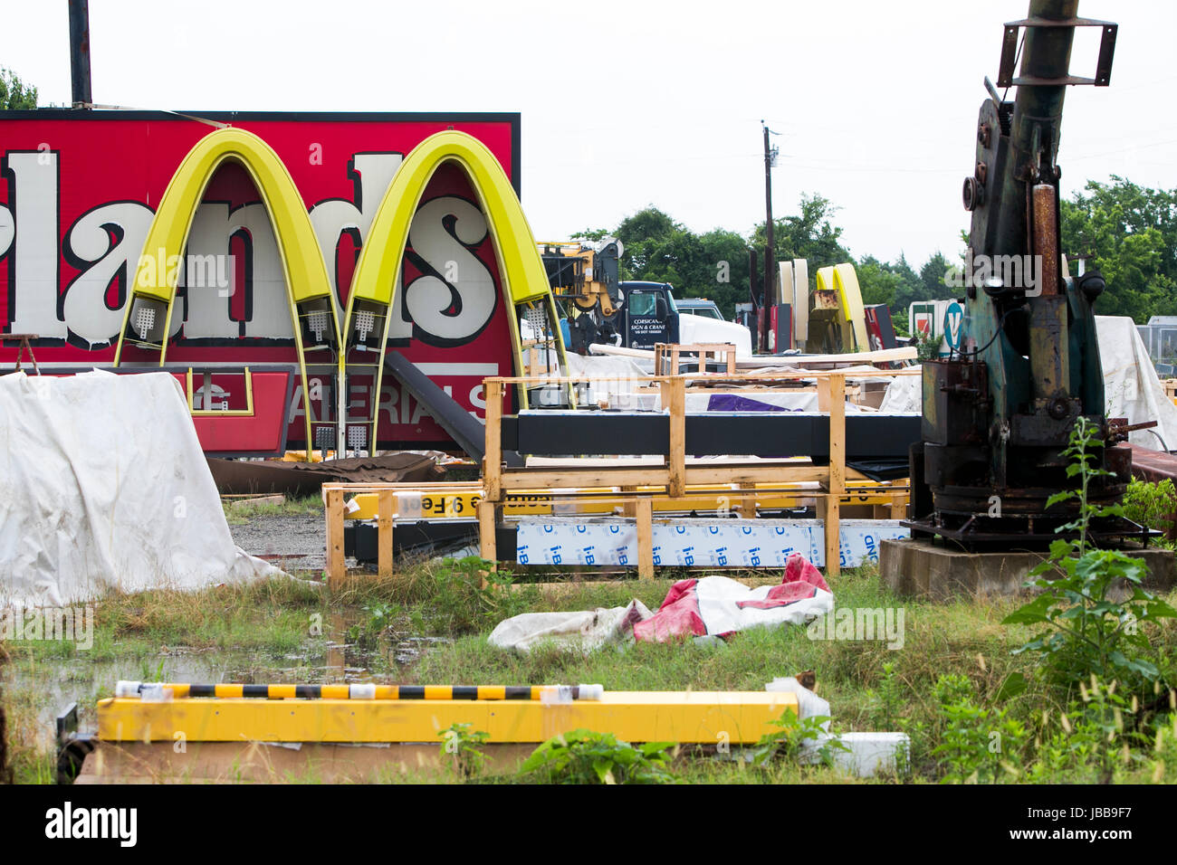 A McDonald's fast food restaurant logo sign in a junk yard in Corsicana, Texas, on May 29, 2017. Stock Photo