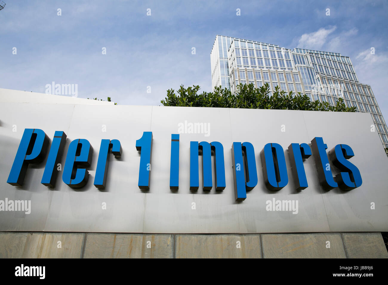 A logo sign outside of the headquarters of Pier 1 Imports Inc., in Fort Worth, Texas, on May 29, 2017. Stock Photo