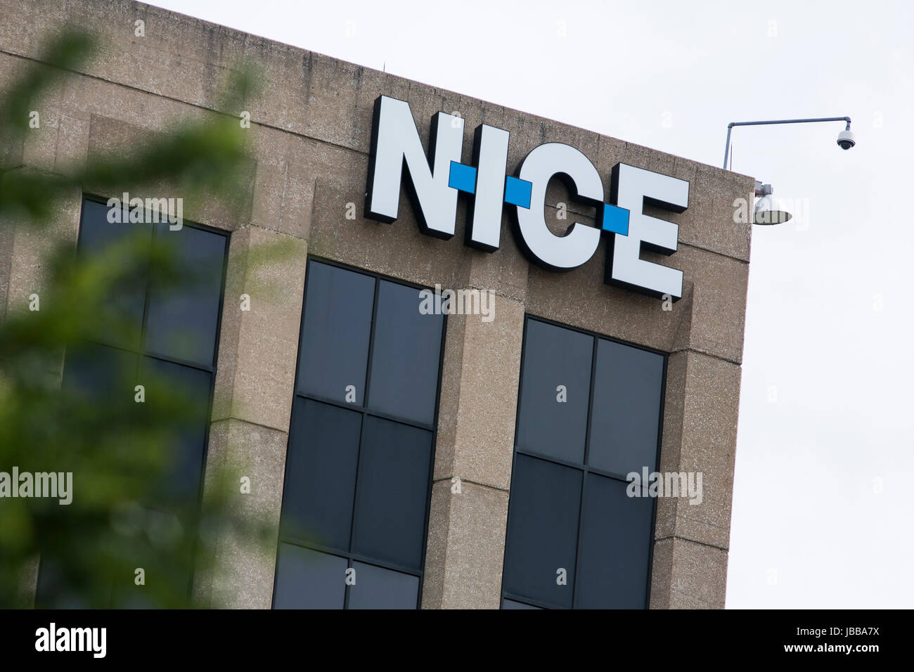 A Logo Sign Outside Of A Facility Occupied By Nice Systems In ...