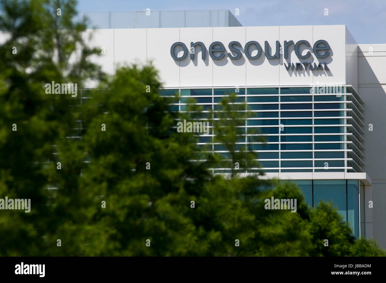A logo sign outside of a facility occupied by OneSource Virtual in Coppell, Texas, on May 29, 2017. Stock Photo
