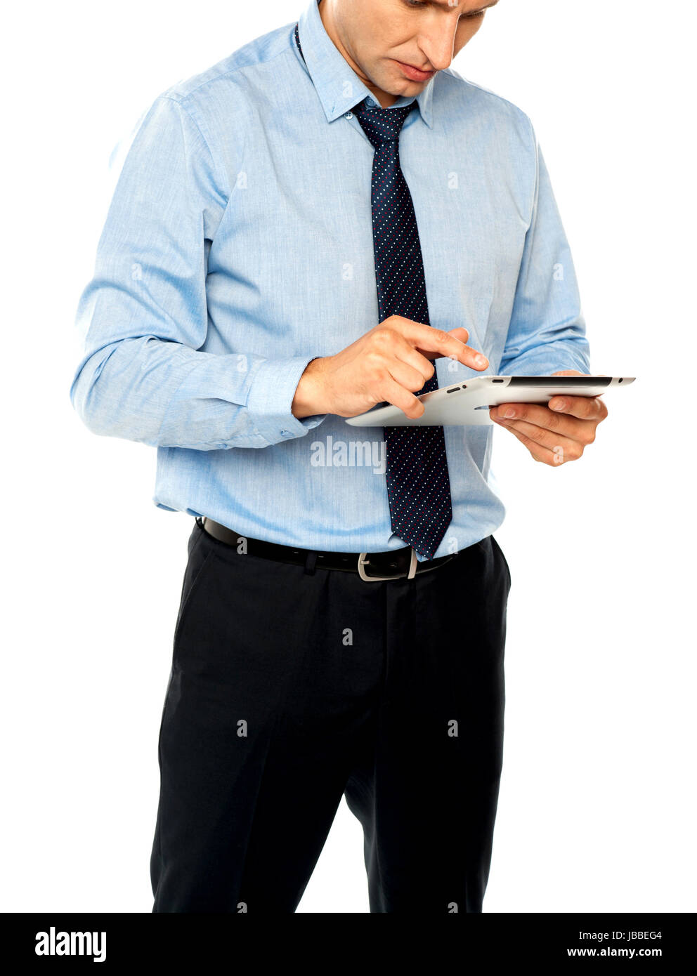 Business professional operating on electronic touch screen device Stock Photo