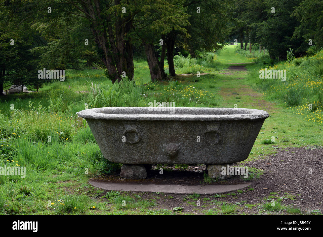 Carved Roman domestic bath in the grounds of Lowther Castle UK Stock Photo